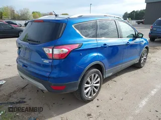 2017 Ford Escape Titanium with VIN 1FMCU0JD1HUA30076, listed as a IAAI auction lot 42024777 with 110,467 mi miles. Bid and sale history available at carsss.com. Image 4.