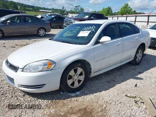2014 Chevrolet Impala LS with VIN 2G1WA5E37E1189080, listed as a IAAI auction lot 42607058 with 128,337 mi miles and . Bid and sale history available at DreamBid. Image 2.