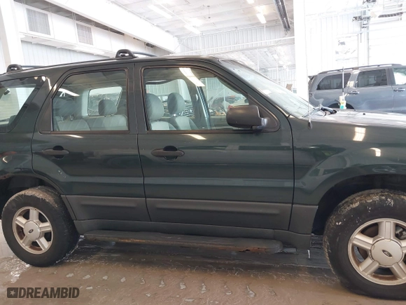 2003 Ford Escape XLS Popular with VIN 1FMYU02143KC35891, listed as a IAAI auction lot 41599760 with 148,381 mi miles. Bid and sale history available at carsss.com. Image 14.