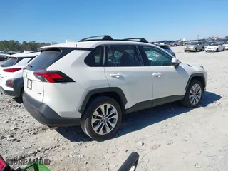 2021 Toyota RAV4 XLE Premium with VIN 2T3C1RFV0MW127432, listed as a IAAI auction lot 41646469 with 28,594 mi miles. Bid and sale history available at carsss.com. Image 4.