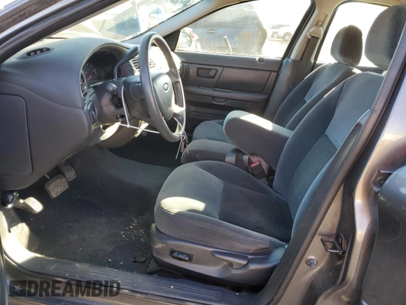 2004 Ford Taurus SES with VIN 1FAFP55UX4A139119, listed as a Copart auction lot 46315495 with 94,110 mi miles and Salvage Title. Bid and sale history available at DreamBid. Image 7.