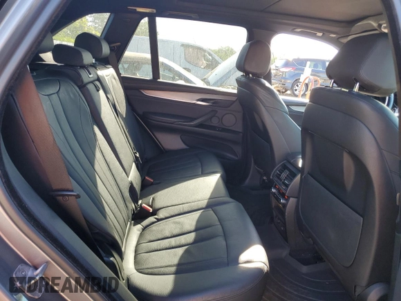 2015 BMW X5 xDrive35i z VIN 5UXKR0C57F0K61171, wystawiony jako Copart lot #57555405 z przebiegiem 119 664 mil mil oraz Szkoda całkowita • Salvage title. Historia ofert i sprzedaży dostępna na DreamBid. Obrazek 11.