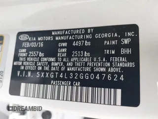 2016 Kia Optima LX with VIN 5XXGT4L32GG047624, listed as a IAAI auction lot 42068219 with 114,316 mi miles. Bid and sale history available at carsss.com. Image 9.