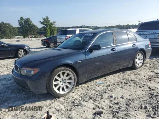 2002 BMW 7 Series 745i with VIN WBAGL63472DP60376, listed as a Copart auction lot 65286175 with 174,628 mi miles and Clean title. Bid and sale history available at DreamBid. Image 1.