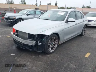 2017 BMW 3 Series 330e iPerformance with VIN WBA8E1C59HK480327, listed as a IAAI auction lot 41809395 with 74,919 mi miles. Bid and sale history available at carsss.com. Image 18.