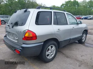 2002 Hyundai Santa Fe GLS with VIN KM8SC73D42U152166, listed as a IAAI auction lot 42088109 with 199,051 mi miles. Bid and sale history available at carsss.com. Image 4.