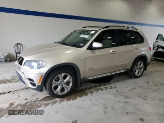 2013 BMW X5 xDrive50i with VIN 5UXZV8C5XDL898978, listed as a Copart auction lot 63655915 with 142,615 mi miles and Salvage title. Bid and sale history available at DreamBid. Image 1.