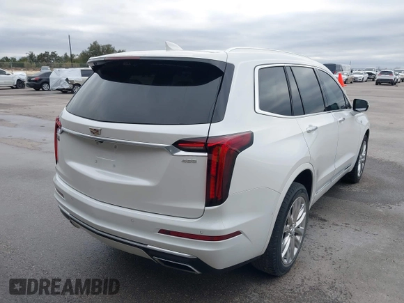 2021 Cadillac XT6 Premium Luxury z VIN 1GYKPCRS8MZ233209, wystawiony jako IAAI lot #40012714 z przebiegiem 45 599 mil mil oraz . Historia ofert i sprzedaży dostępna na DreamBid. Obrazek 4.