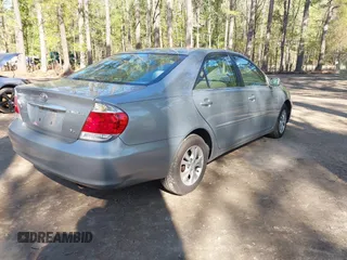 2005 Toyota Camry LE with VIN 4T1BF32K25U612669, listed as a IAAI auction lot 41987399 with 315,639 mi miles and . Bid and sale history available at DreamBid. Image 4.
