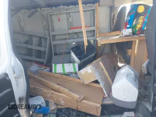 2019 Chevrolet Express Cargo with VIN 1GCWGBFG8K1317771, listed as a IAAI auction lot 41205692 with Not provided miles and . Bid and sale history available at DreamBid. Image 8.