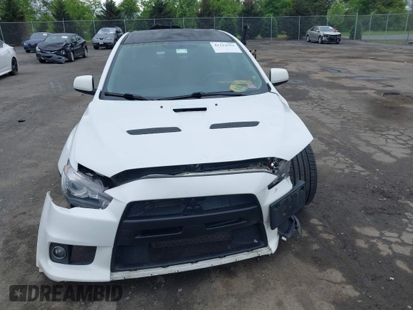 2013 Mitsubishi Lancer Evolution GSR z VIN JA32W8FV0DU023509, wystawiony jako IAAI lot #42222552 z przebiegiem 128 030 mil mil oraz . Historia ofert i sprzedaży dostępna na DreamBid. Obrazek 12.