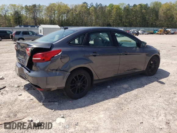 2016 Ford Focus SE z VIN 1FADP3F23GL355587, wystawiony jako Copart lot #53462345 z przebiegiem 101 628 mil mil oraz Szkoda całkowita • Salvage title. Historia ofert i sprzedaży dostępna na DreamBid. Obrazek 3.