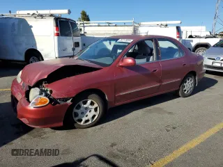 2000 Hyundai Elantra GLS z VIN KMHJF35F9YU919481, wystawiony jako Copart lot #79717924 z przebiegiem 137 918 mil mil oraz Szkoda całkowita • Salvage title. Historia ofert i sprzedaży dostępna na DreamBid. Obrazek 1.