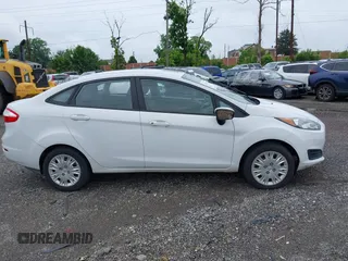 2014 Ford Fiesta S with VIN 3FADP4AJ1EM236338, listed as a IAAI auction lot 42610717 with 136,248 mi miles and . Bid and sale history available at DreamBid. Image 14.