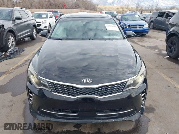 2016 Kia Optima SX Turbo with VIN 5XXGW4L2XGG052746, listed as a IAAI auction lot 41306792 with 69,571 mi miles and . Bid and sale history available at carsss.com. Image 12.