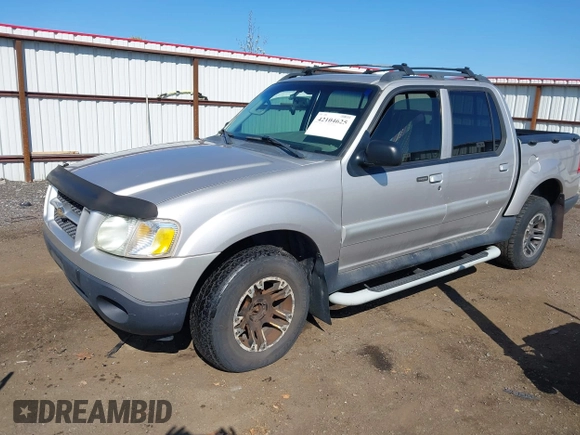 2003 Ford Explorer Sport Trac XLS z VIN 1FMZU77E63UA25807, wystawiony jako IAAI lot #42104625 z przebiegiem 230 608 mil mil oraz . Historia ofert i sprzedaży dostępna na DreamBid. Obrazek 2.
