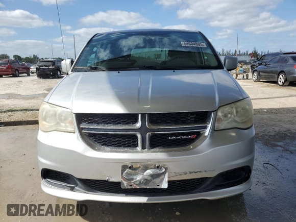 2012 Dodge Grand Caravan SXT with VIN 2C4RDGCG3CR373377, listed as a Copart auction lot 54604805 with 168,067 mi miles and Salvage Title. Bid and sale history available at DreamBid. Image 5.