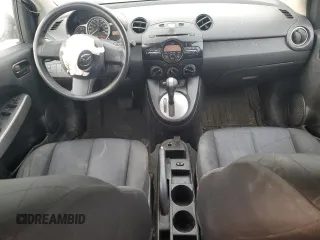 2012 Mazda 2 Sport with VIN JM1DE1KY8C0145089, listed as a Copart auction lot 52093925 with 211,282 mi miles and Salvage Title. Bid and sale history available at DreamBid. Image 8.