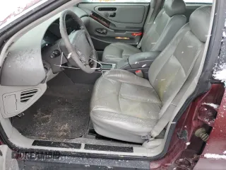 1999 Oldsmobile Aurora with VIN 1G3GR62C8X4113745, listed as a Copart auction lot 60573923 with 177,809 mi miles and Salvage Title. Bid and sale history available at DreamBid. Image 7.