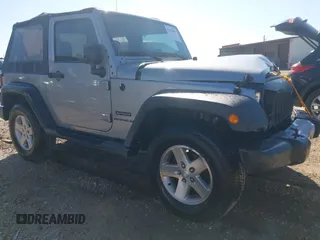 2016 Jeep Wrangler Sport z VIN 1C4AJWAG5GL204706, wystawiony jako IAAI lot #42010846 z przebiegiem 153 941 mil mil oraz . Historia ofert i sprzedaży dostępna na DreamBid. Obrazek 1.