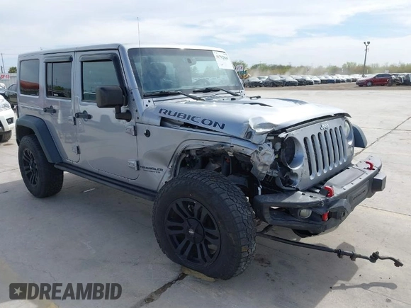 2015 Jeep Wrangler Unlimited Rubicon Hard Rock с VIN 1C4HJWFG6FL762537, выставлен на аукционе IAAI как лот 41792066 с пробегом 125 829 миль миль и . История ставок и продаж доступна на DreamBid. Изображение 1.