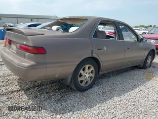 1999 Toyota Camry LE z VIN JT2BF28K9X0216439, wystawiony jako IAAI lot #42213626 z przebiegiem 280 812 mil mil oraz . Historia ofert i sprzedaży dostępna na DreamBid. Obrazek 4.