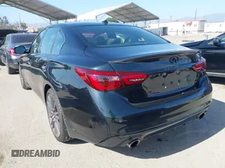 2024 Infiniti Q50 Red Sport 400 with VIN JN1FV7DP6RM660306, listed as a IAAI auction lot 42272726 with 962 mi miles and . Bid and sale history available at DreamBid. Image 3.