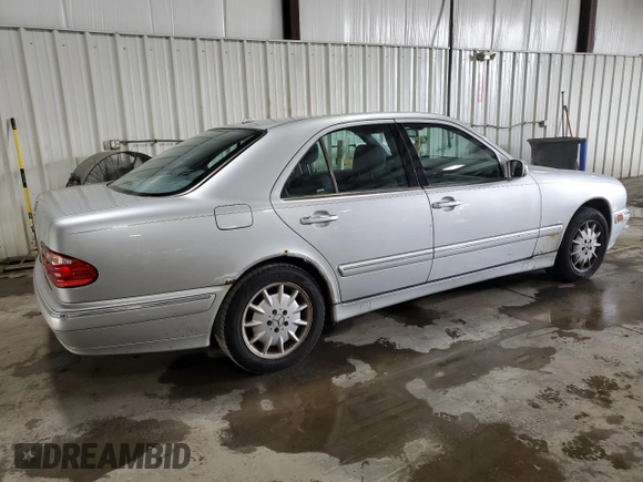 2001 Mercedes-Benz E-Class with VIN WDBJF65J61B198210, listed as a Copart auction lot 72616744 with 305,814 mi miles and Salvage Title. Bid and sale history available at carsss.com. Image 3.