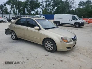 2009 Kia Spectra EX with VIN KNAFE221X95648679, listed as a Copart auction lot 55967485 with 182,740 mi miles and Non Repairable. Bid and sale history available at DreamBid. Image 4.