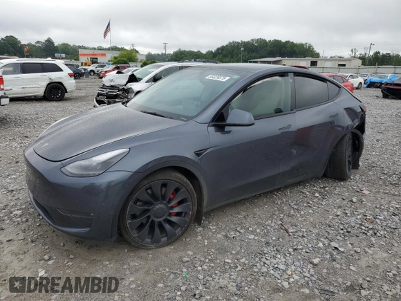 2022 Tesla Model Y Performance with VIN 7SAYGDEF7NF507184, listed as a Copart auction lot 58329875 with 98,320 mi miles and Salvage title. Bid and sale history available at DreamBid. Image 1.