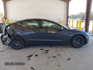 2025 Tesla Model 3 Long Range with VIN 5YJ3E1EA1SF923548, listed as a IAAI auction lot 42046257 with 3,979 mi miles and . Bid and sale history available at carsss.com. Image 13.