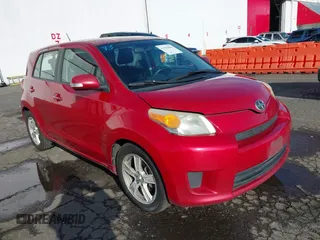 2009 Scion xD with VIN JTKKU10459J033808, listed as a IAAI auction lot 41529606 with 195,263 mi miles. Bid and sale history available at carsss.com. Image 1.