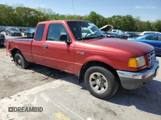 2002 Ford Ranger XLT Appearance with VIN 1FTYR44E32PA07430, listed as a Copart auction lot 54067335 with 209,433 mi miles and Salvage title. Bid and sale history available at DreamBid. Image 4.