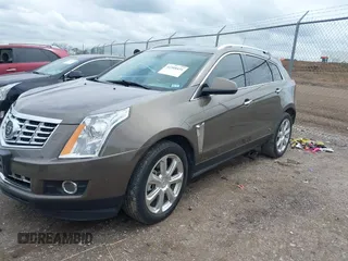 2014 Cadillac SRX Performance Collection with VIN 3GYFNCE31ES509461, listed as a IAAI auction lot 41908431 with 150,915 mi miles. Bid and sale history available at carsss.com. Image 2.