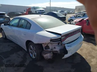 2021 Dodge Charger SXT with VIN 2C3CDXBG5MH605867, listed as a IAAI auction lot 41682336 with 56,660 mi miles and . Bid and sale history available at DreamBid. Image 14.