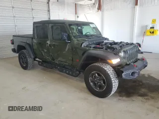 2023 Jeep Gladiator Rubicon with VIN 1C6JJTBGXPL537729, listed as a Copart auction lot 53788625 with 17,568 mi miles and Salvage title. Bid and sale history available at DreamBid. Image 4.