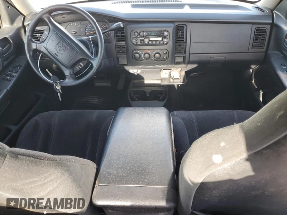 2001 Dodge Dakota Sport z VIN 1B7GL2AN81S120632, wystawiony jako Copart lot #50730415 z przebiegiem 191 302 mil mil oraz Czysty tytuł • Clean title. Historia ofert i sprzedaży dostępna na DreamBid. Obrazek 8.