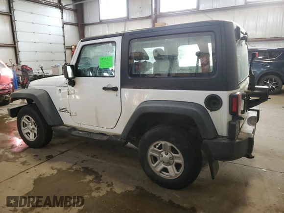 2011 Jeep Wrangler Sport with VIN 1J4AA2D12BL555530, listed as a Copart auction lot 42049915 with 83,349 mi miles and Salvage Title. Bid and sale history available at carsss.com. Image 2.