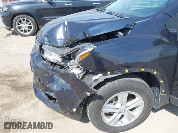 2022 Chevrolet Trax LT with VIN KL7CJPSM7NB568709, listed as a IAAI auction lot 42061802 with 28,995 mi miles and . Bid and sale history available at DreamBid. Image 6.