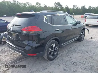 2017 Nissan Rogue SL with VIN JN8AT2MT5HW401066, listed as a IAAI auction lot 42097429 with 164,053 mi miles and . Bid and sale history available at DreamBid. Image 4.