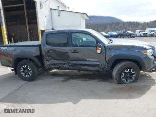 2018 Toyota Tacoma SR with VIN 3TMCZ5ANXJM187546, listed as a IAAI auction lot 41941130 with 83,288 mi miles. Bid and sale history available at carsss.com. Image 6.