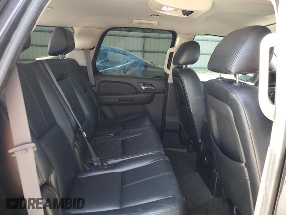 2011 Chevrolet Tahoe LS with VIN 1GNSCAE09BR139659, listed as a Copart auction lot 52492505 with 97,365 mi miles and Salvage title. Bid and sale history available at DreamBid. Image 12.