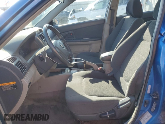 2005 Kia Spectra LX z VIN KNAFE121655113045, wystawiony jako Copart lot #61199595 z przebiegiem 156 310 mil mil oraz Szkoda całkowita • Salvage title. Historia ofert i sprzedaży dostępna na DreamBid. Obrazek 7.