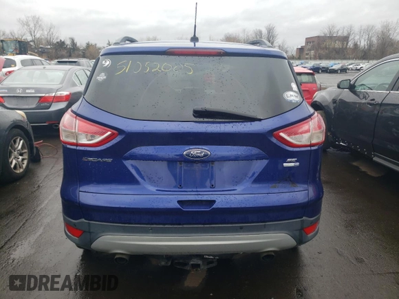 2016 Ford Escape SE with VIN 1FMCU9GX9GUA46272, listed as a Copart auction lot 51052005 with 129,350 mi miles and Salvage Title. Bid and sale history available at carsss.com. Image 6.
