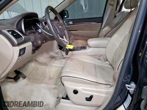2016 Jeep Grand Cherokee Overland with VIN 1C4RJFCT9GC334520, listed as a Copart auction lot 56886055 with 84,390 mi miles and Clean title. Bid and sale history available at DreamBid. Image 7.