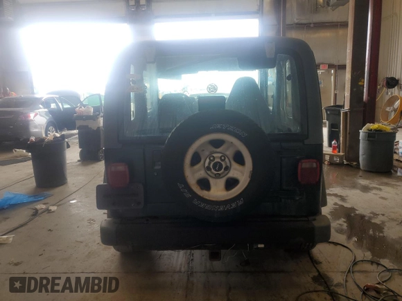 2000 Jeep Wrangler SE with VIN 1J4FA29P0YP773020, listed as a Copart auction lot 49478865 with 106,414 mi miles and Clean Title. Bid and sale history available at carsss.com. Image 6.