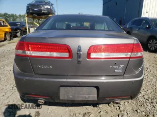 2012 Lincoln MKZ z VIN 3LNHL2JC0CR823283, wystawiony jako Copart lot #43361965 z przebiegiem 128 053 mil mil oraz Szkoda całkowita • Salvage title. Historia ofert i sprzedaży dostępna na DreamBid. Obrazek 6.