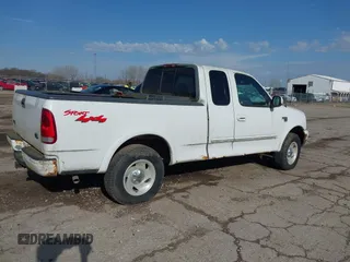 1999 Ford F-150 XL with VIN 2FTRX18L7XCA69231, listed as a IAAI auction lot 41880011 with 1 mi miles. Bid and sale history available at carsss.com. Image 4.