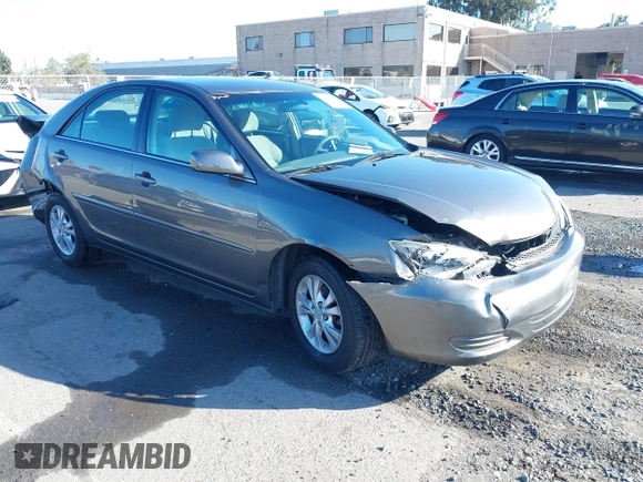2004 Toyota Camry LE with VIN 4T1BF30K94U577260, listed as a IAAI auction lot 41906287 with 68,499 mi miles. Bid and sale history available at carsss.com. Image 1.