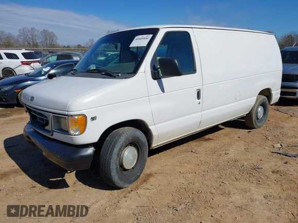 1999 Ford Econoline Cargo with VIN 1FTRE14W0XHB64440, listed as a IAAI auction lot 41645551 with 239,114 mi miles. Bid and sale history available at carsss.com. Image 17.